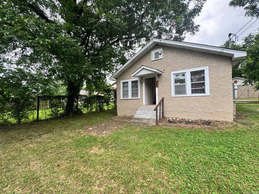 Welcome to 125 Plain St in Hot Springs, AR — a well-maintained 2-bedroom, 2-bath home featuring durable no-carpet flooring throughout and a separate storage building for extra belongings. The property includes a fenced-in area ideal for privacy and safely containing outdoor items. Bright interior spaces and a straightforward layout make this residence practical and easy to maintain. Located in Hot Springs, the home offers convenient access to local amenities and services.