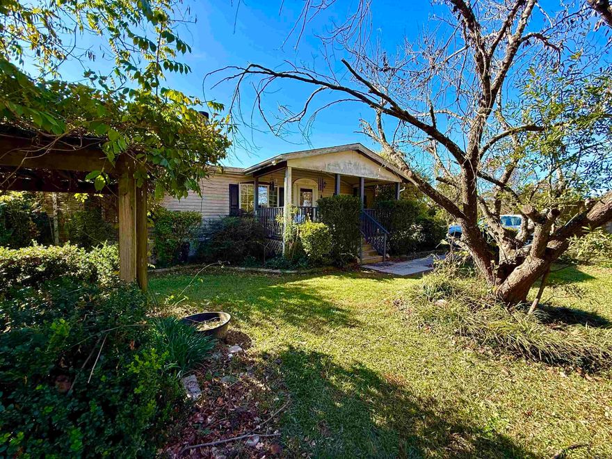 Discover peaceful country living at 4260 Midway Road. This 2004-built 3 bedroom, 2 bath mobile home sits on 1.7 acres and offers the privacy and space so many buyers are searching for in the Donaldson/Malvern area. A tree-lined easement driveway welcomes you home and sets the tone for a quiet, lifestyle-driven retreat.  Inside, enjoy 1,300 sq. ft. of comfortable living with a cozy fireplace, all-electric systems, a spacious kitchen and dining area, and a split floor plan. The primary suite features a large bathroom with a separate shower and soaking tub, while the secondary bedrooms offer plenty of room and separation for family or guests.  Outside is where this property truly shines—featuring a 24x30 metal shop plus two additional pole sheds (20x24 and 20x10), ideal for equipment, hobbies, or storage. With room to garden, raise animals, or simply enjoy wide-open space, this property delivers the country lifestyle with easy commutes to Malvern, Arkadelphia, and Hot Springs.  A great opportunity for anyone seeking privacy, acreage, and comfort in Southwest Arkansas.