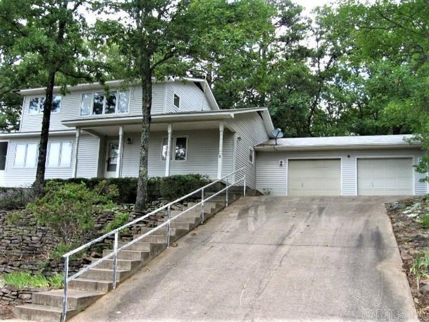 HUGE LAKEVIEW FAMILY HOME JUST UPDATED!!!  New flooring, new fixtures, new kitchen appliances and washer/dryer.  Most new light fixture. Very spacious.  Main Level:  living/dining area, open kitchen with eating area (all new appliances), 2 BR & 2 Ba. Plus large screened in porch.   Upper Level:  2 BR, 1 Ba, plus den with kitchen sink/cabinets & apartment size refrigerator!!  This could be a great office for someone working remotely, or a hobby room/BR.  Lake views from several rooms.  2-Car Garage with lots of space.  Nice landscaping.  Come enjoy this nice home!!!  Rental Application Required.  6- or 12-month Lease.  Security Deposit somewhat flexible.  NO SMOKERS NEED APPLY.  Pet must be approved.