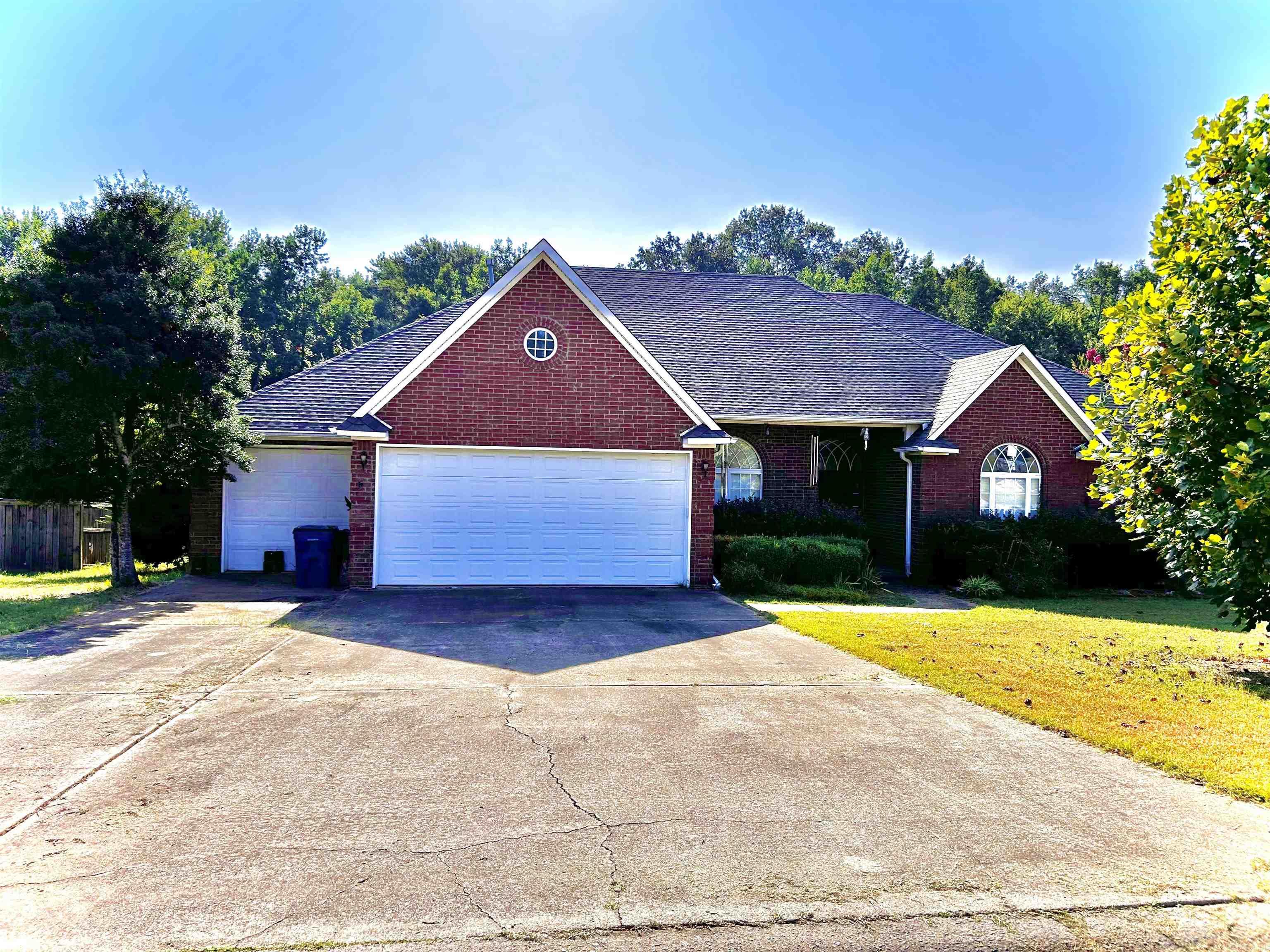 Nice one owner home in the desirable Shiloh Subdivision offering a great location, lots of space, and privacy. This 3 bedroom, 2 1/2 bath home sits on almost a full acre lot with a fenced in back yard and private outdoor setting at the back of the property. It has a two car garage, with an additional side garage, and a storage building in the back. The home features two living areas, formal and kitchen dining areas, a sunroom, and a home office with French doors and a vaulted ceiling. A new roof was installed in 2023. The kitchen has stainless appliances and all new cabinets. All appliances stay with the home, including the refrigerator, washer/dryer and a freezer in the garage. The home includes two water heaters and a Generac 20kw whole home generator. Also included will be a riding lawn mower, hedge trimmer, leaf blower, and other assorted lawn care tools. This home has lots to offer. More pictures coming soon. Home is being sold AS IS. Agents see remarks