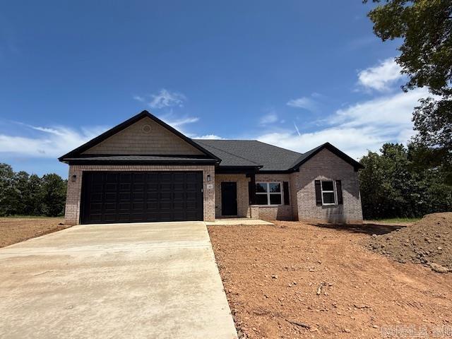 Looking for a new home on a large lot. This is it! Enjoy the view from your back porch. You will likely see a few deer. Large living room open to the kitchen. Nice sized island in the kitchen with cabinetry in the island. Guest rooms are separate from the primary bedroom. Has a nice yard with trees. The backyard is private with woods behind the home.