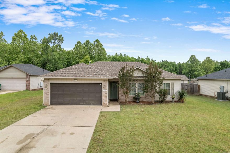 Charming 3 BD, 2 BA home with 1,152 sq ft in Austin! Recent improvements include new flooring, fresh paint throughout, and a new stove in 2026, plus a new roof in 2023. This single-level home features an open living/dining area, white kitchen cabinetry, stainless steel appliances, breakfast bar, and decorative backsplash.  Enjoy a fenced backyard with a covered patio/pergola area, perfect for relaxing or entertaining. This home also features an extra heated and cooled room off the entry for use such as a man cave, craft room or office. Move-in ready and conveniently located in an established neighborhood!