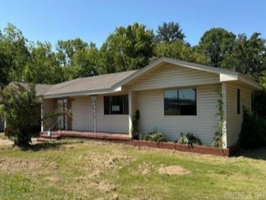 Attractive two bedroom home on corner lot. Nice two car carport, across from park. Home has had some updates but may need more cosmetics to update. Wood floors and bright kitchen. Great fixer upper opportunity. RESERVE AUCTION PROPERTY- Property sold “AS-IS” without contingencies, repairs, warranties, guarantees or representation as to listing accuracy, property information, photo or other depiction included or described herein. Inspect before bidding.