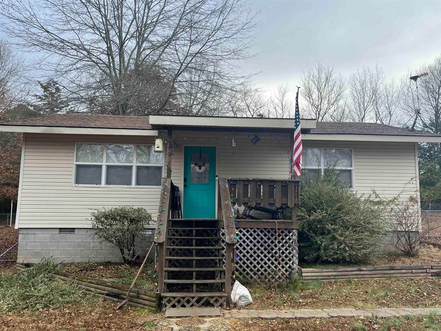 TUCKED AWAY ON THE OUTSKIRTS OF TOWN IS THIS CHARMING HOME! This adorable 2 bedroom 1 bathroom is perfectly set on 1.39 acres, making a generous yard AND fenced in with large garage/shop in the back! Turn key ready to move in, already updated, and a BRAND NEW HVAC! QUALIFIES FOR ZERO DOWN! Call today!