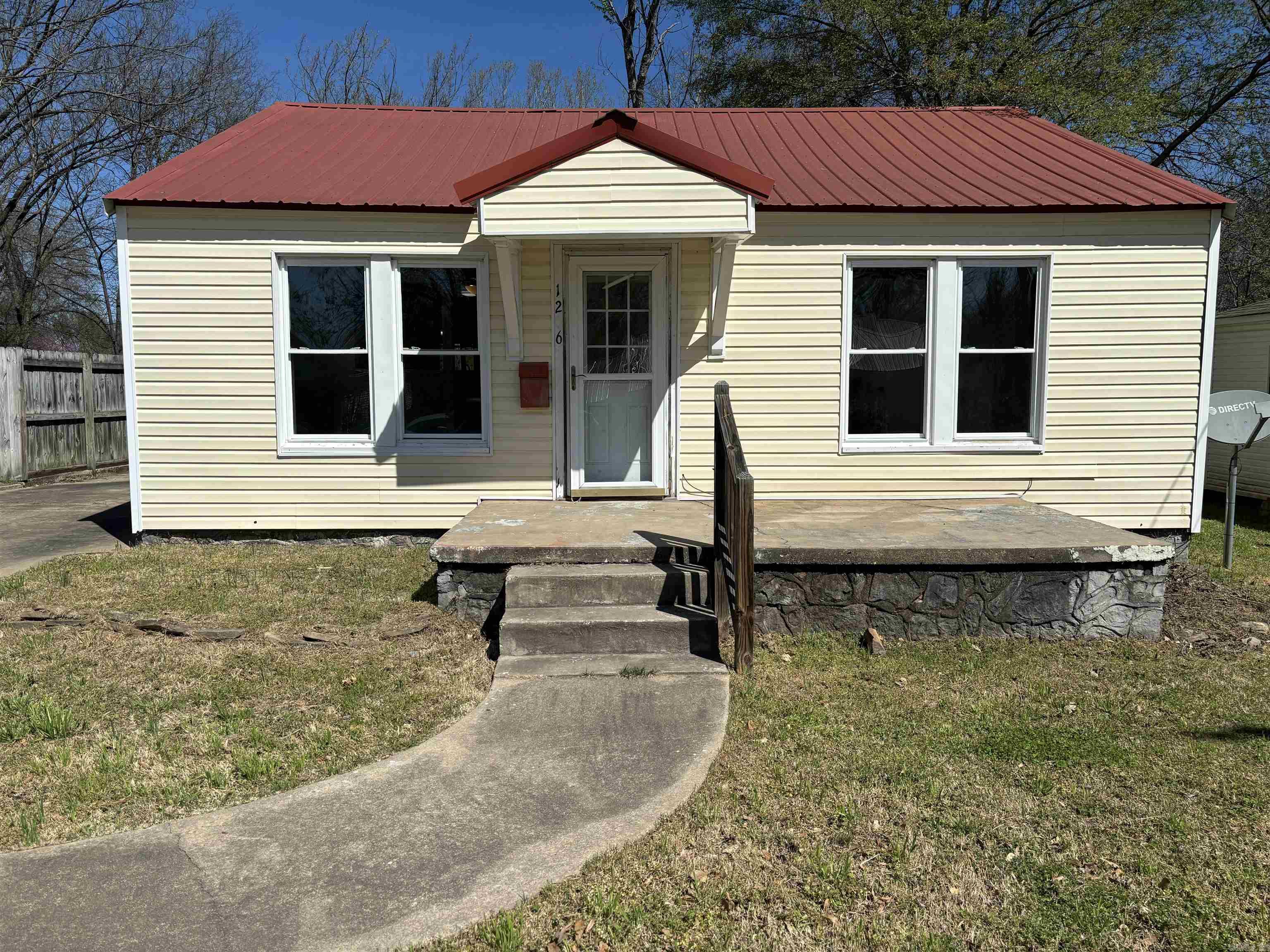 Don't miss this updated, affordable home. Perfect for a starter home for college students, young couples or for someone looking to downsize. This house has updated paint, lighting and flooring. Large laundry room, new range/oven and water heater. Outside features are a metal roof, power washed siding and back covered deck. Large enclosed back yard. Book your appointment today!