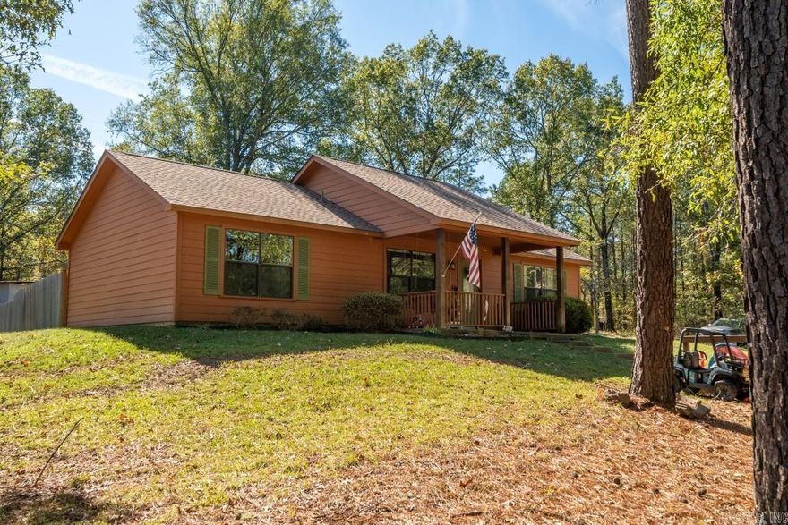 Nestled on a two-acre parcel of land, this charming country home offers the perfect blend of rustic beauty and modern comfort.  With three bedrooms, two baths, a fenced backyard and a secluded wooded lot, this residence is a haven for those seeking tranquil escape from the hustle and bustle from city life.  This is a perfect home for a cozy retirement or a place to raise a family.  Take a drive out to see this beautiful property and house, you will fall in love!