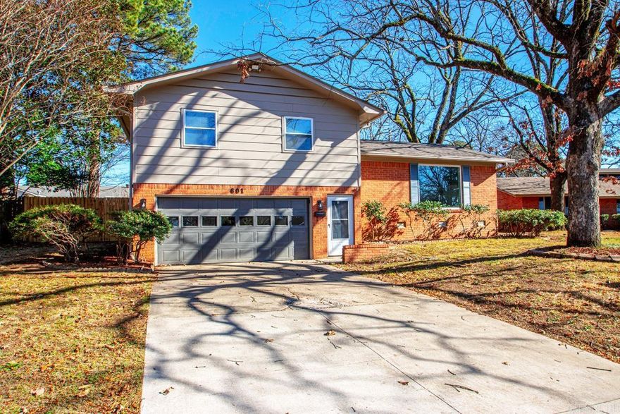 Welcome home to this beautifully remodeled split-level gem designed for both comfort and entertaining! From the moment you step inside, you’ll appreciate the thoughtful updates and versatile layout that make this home truly shine.  The split-level design offers distinct yet connected living spaces, perfect for hosting gatherings or enjoying everyday living.Downstairs, you’ll find additional space perfect for a media room, game room, or guest retreat. Step outside to a fully fenced backyard perfect for pets, play, or outdoor entertaining. Whether you’re hosting summer barbecues or enjoying quiet evenings under the stars, this outdoor space offers endless possibilities.  Additional highlights include a spacious 2-car garage for convenience and storage, along with modern finishes throughout that make this home truly move-in ready. If you’re looking for a stylish, functional home made for entertaining, this one checks all the boxes!