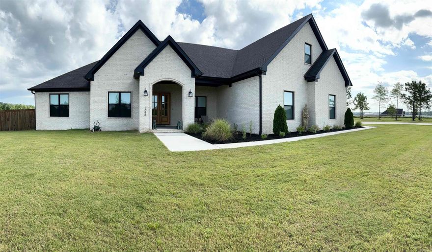 Open House Sunday, July 14, 2024 from 2-4 pm!   Stunning home on almost 2-acre lot in Hope Valley Estates. Step through the beautiful entry to find a large open concept living, dining, kitchen area with beautiful windows and tons of natural light. Gas log fireplace in living can be enjoyed from the entire main area. Quartz countertops and great closet and cabinet storage throughout. 4 bd, 2.5 ba down plus bedroom / bonus and full bath upstairs. Gorgeous back porch with gas fireplace is perfect for relaxing or entertaining. Tankless hot water heater, hot and cold water outside at driveway, fully fenced back yard, and FIBER INTERNET! Adjacent 1.8 acre lot is listed separately. Lot has been cleared and made into a private, park-like addition to this home. Don’t miss this rare treasure in Hope Valley Estates!  Agents see remarks