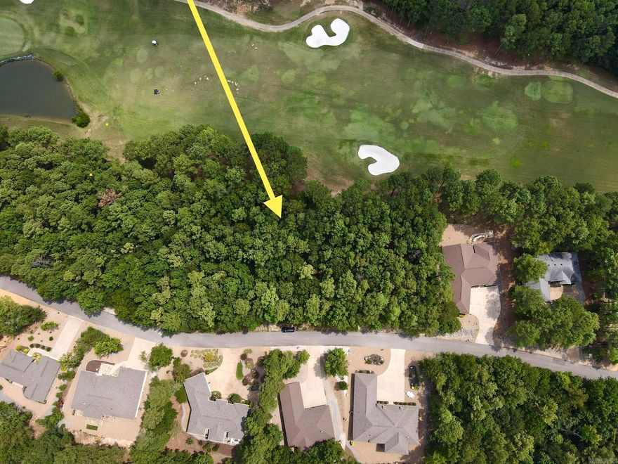 Granada Golf Course Lot on Hole #4 New Member Buy-in Fee due at closing. Come build your new golf front home in Hot Springs Village! It is home to 11 recreational lakes, nine championship golf courses, 13 tennis courts, 14 pickleball courts, 30 miles of walking trails, more than 200 clubs and organizations and numerous additional activities for all ages. Spanning 26,000 acres of the Ouachita Mountains, Hot Springs Village is the largest gated community inNorth America. New Member Buy-in Fee due at closing.
