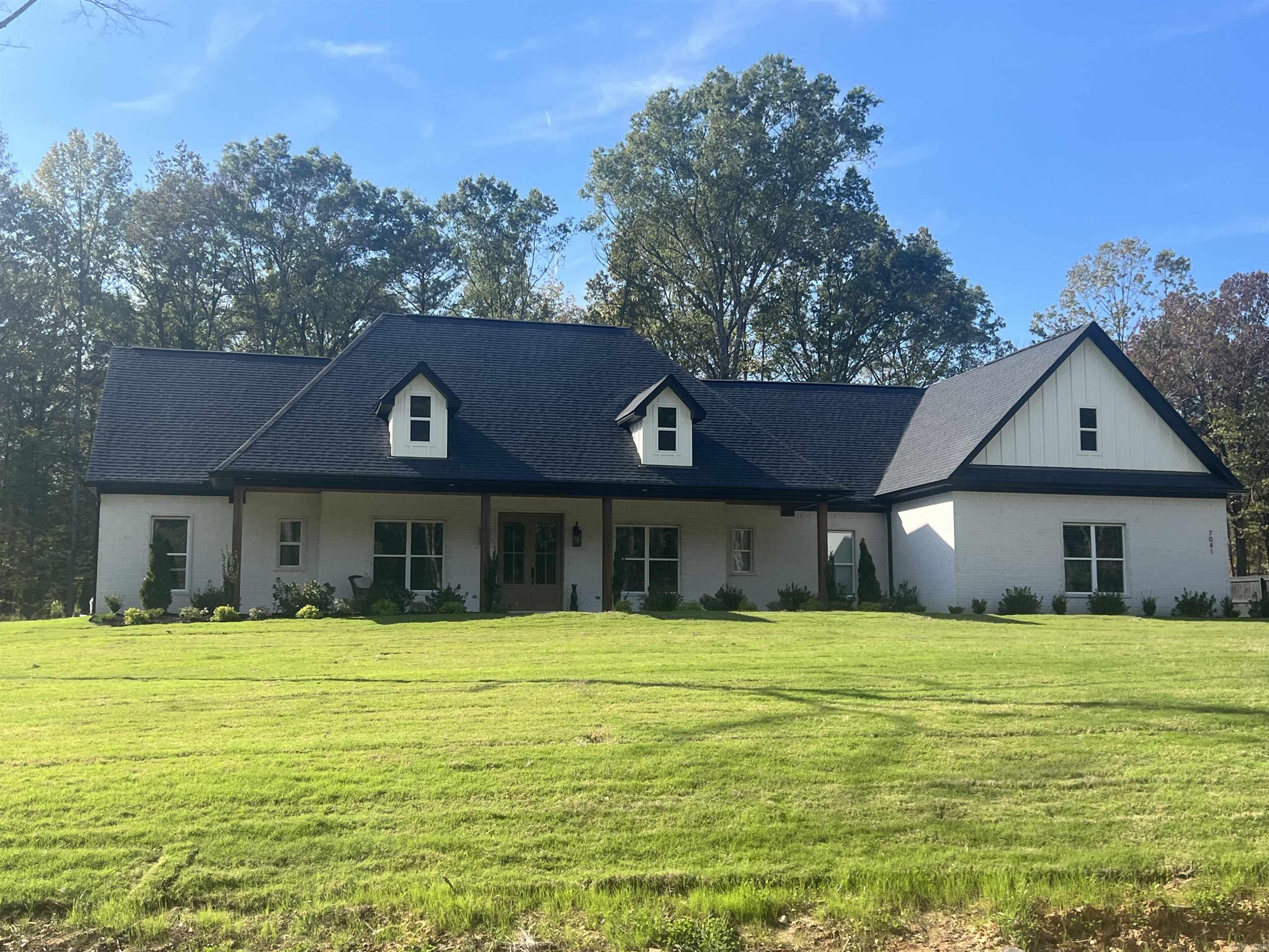 Beautiful home on nice acreage and a pool