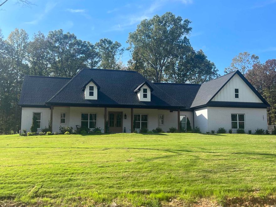 Beautiful home on nice acreage and a pool