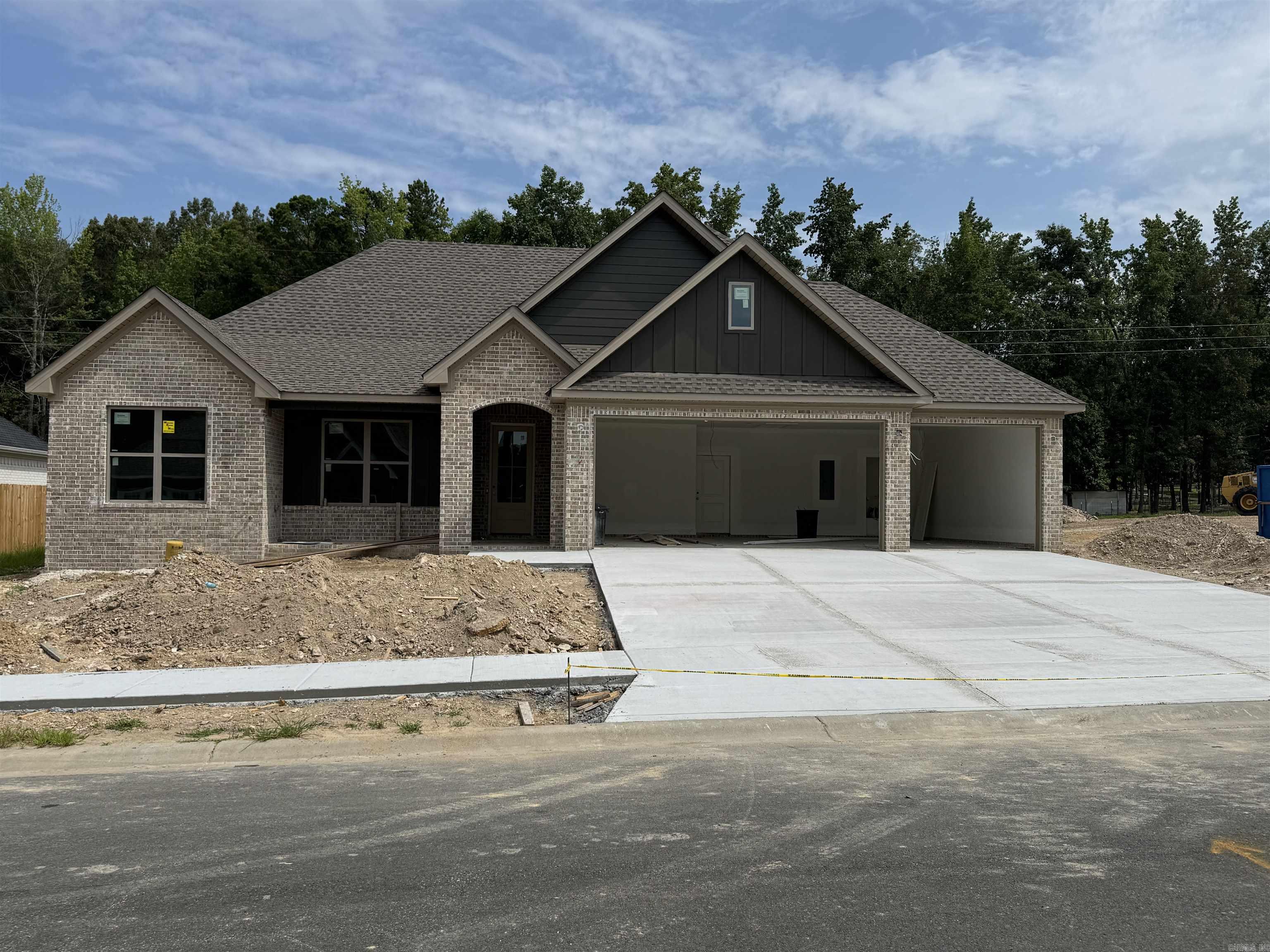Beautiful New Construction Home located in the new Roman Heights Subdivision.. Amenities Include: Approximately 2123 SF, 4 Bedrooms, 2 Bathrooms, Living Room with gas log fireplace, Open Floor Plan, Kitchen/Dining Combo, Living/Dining Combo, Large Kitchen Island, Breakfast Bar, Split Bedroom Floorplan, Custom Tile Shower, Pantry, Laundry Room, LVP Flooring in main areas, Nice Lot, Covered Rear Patio with wood burning fireplace, Covered Front Porch, 3 Car Garage, Bryant Schools, And Much More. A Must See....