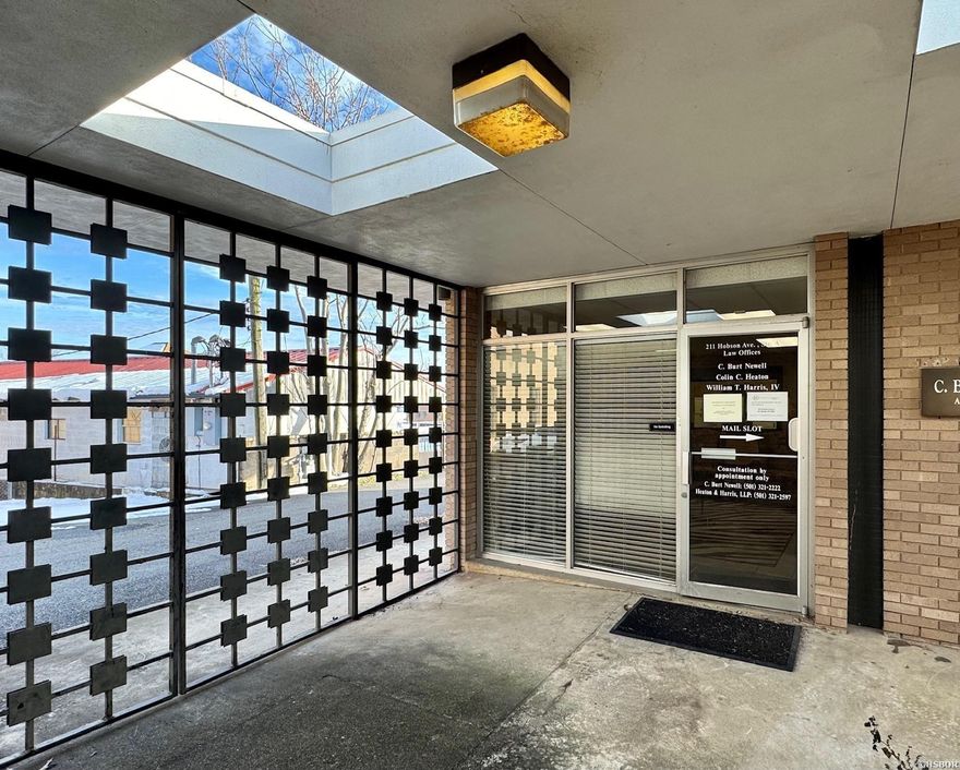 Large office condo in a great location!  The office has a spacious waiting room, reception area, six offices, four bathrooms, kitchen/break room, conference room(s) and several storage rooms.   This space would be ideal for a professional office, insurance agency, real estate brokerage, call center, etc...  Huge parking lot adjacent to the building.   The monthly POA dues cover the utilities, insurance, trash, landscaping and parking lot maintenance.