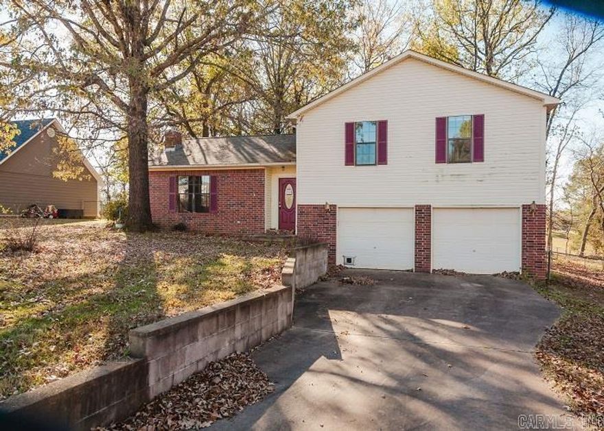 This split level home sits on a huge shady lot! It's got tons of appeal, cabinets and space. Some repairs needed. Hard surface flooring. Big storage in back. RESERVE AUCTION PROPERTY- Property sold “AS-IS” without contingencies, repairs, warranties, guarantees or representation as to listing accuracy, property information, photo or other depiction included or described herein. Inspect before bidding.