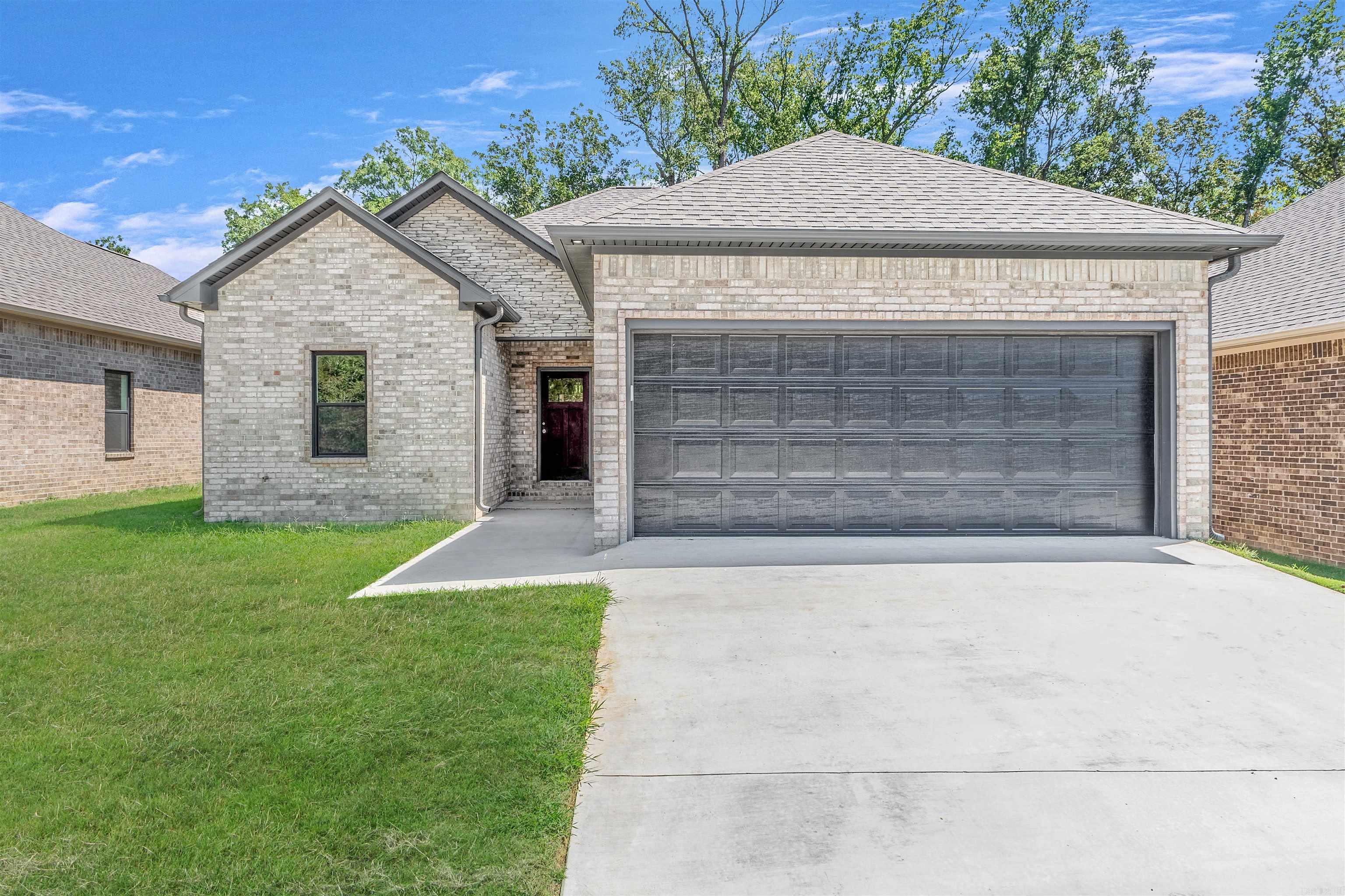 This beautiful NEW CONSTRUCTION home has been getting lots of attention, now that the black cabinets and doors are being set off with touches of gold in the finishes. All wood cabinets, quartz countertops, 9' ceilings throughout and vaulted wood ceiling in the living room! This location between Little Rock Air Force Base and the interstate makes it wonderfully versatile! Construction due to be completed in Sept 2025! Agents, please see remarks.