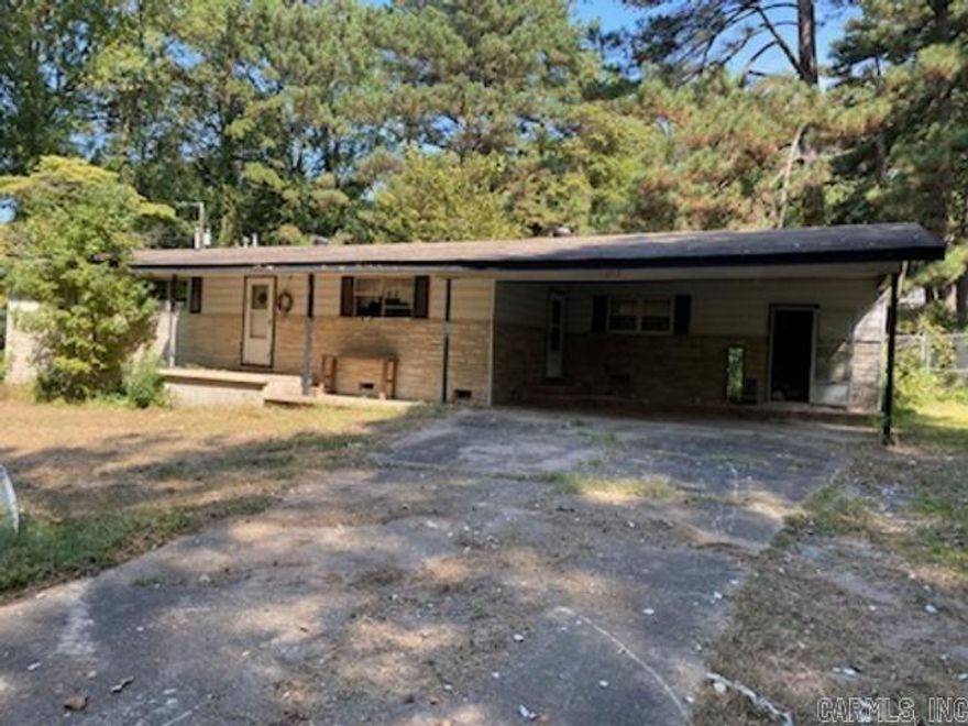 Old HOME PLACE- HOUSE IS NEED OF TOTAL UPDATING/REMODELLING ..SEVERAL OUTSIDE BUILDINGS.... HOUSE IS ON SEPTIC SYSTEM AGE IS APPROX -  NOT IN CITY LIMITS **POSSIBLY 2 BUYERS COULD PURCHASE AND DIVIDE 2- 3 ACRE LOTS AN BUILD HOMES ??????? JUST A THOUGHT ????  ...wonderful large trees on property.....