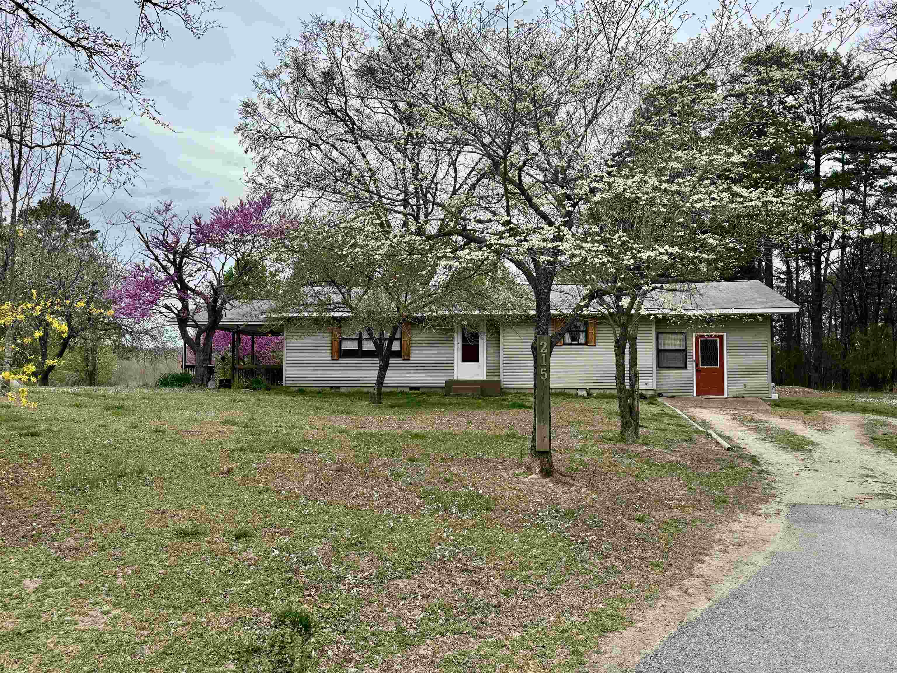 *NEW ROOF* Large Home on 20 acres m/l in Calico Rock! This 3 Bedroom, 2 bath home features two living areas, recently remodeled kitchen with granite countertops, and a large master suite with a walk in closet and large windows! There is a bonus room that would make a great mudroom, office, or additional bedroom if needed. Outside the home is a 20x20 shop with electric with a lean to for extra storage. There is a barn along with fenced in area for livestock! Fantastic spot to have a hobby farm! There is also a storm shelter, large patio, fruit trees, and two ponds! Property is located on a paved road within 1 mile of the White River. So many possibilities with this property!