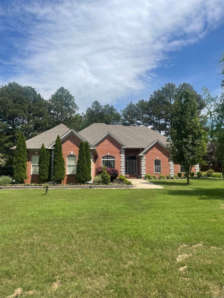 Beautiful home in Stoneridge built by Jackie Stevens. 3 bedrooms, 2 and 1/2 baths. 12’ ceilings in Den and has a wood burning fireplace. Open floor plan to Dining room. Breakfast room with eat at bar. Cabinets are pull out. Stainless appliances. Nice office with built in shelves and workspace. Roof is 2016, HVAC 2024 and 2022. Inside Utility room. Large laundry room w sink. Spacious additional room that can be used for second living space such as den, kids room or workroom. Crown Molding throughout. Irrigation system. Floored attic. 3 car garage.