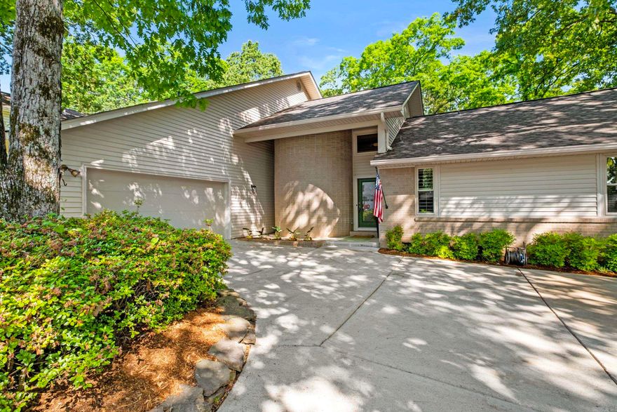 Wow!!! This Home is so very Awesome and Private. Almost 30 years of love has been put into this home by the seller. When you walk in the front door You will see  the beautiful Updates that have been added and how well it has been maintained. With 2 bedrooms including the master on the main level and 2 baths, an open kitchen and living area, with large windows that look out into green space. A large deck across the entire back of the house is an amazing area to sit and enjoy nature and five mile Creek. Upstairs enjoy 2 more bedrooms with a full bath, game room and a craft room. New HVAC downstairs, new HWH, Roof 2024, Kitchen remodel 2015 plus much more. See the Extra lot available next door $42,500. Take a look Today!! See agent remarks