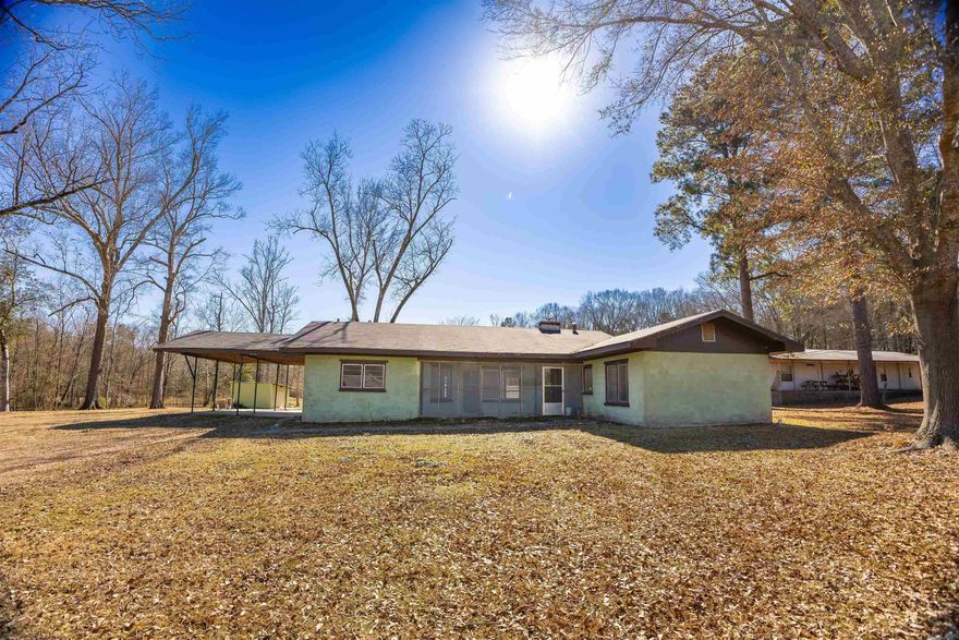40 acres in Norphlet?! Yes please.   3 bedroom home, workshop, and a barn. Bonus bathroom off of the laundry room. Plus, the acreage gives you the opportunity to make the entire property your own.  Property to be sold As-Is.