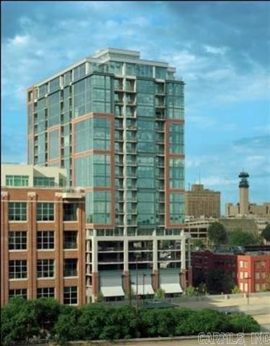 Modern 1 bedroom condo with extra large terrace with water access and power. Wood cabinets with white quartz. Stainless steel appliances . Scored concrete floors. Ceilings are exposed concrete.   Located in the heart of the River Market District within walking distance of area restaurants, bars, galleries and shops.Building exterior is brick and glass.  Swimming pool, fitness center, tennis and basketball courts, rooftop deck and party room and concierge service included.  1 parking space 1 storage unit