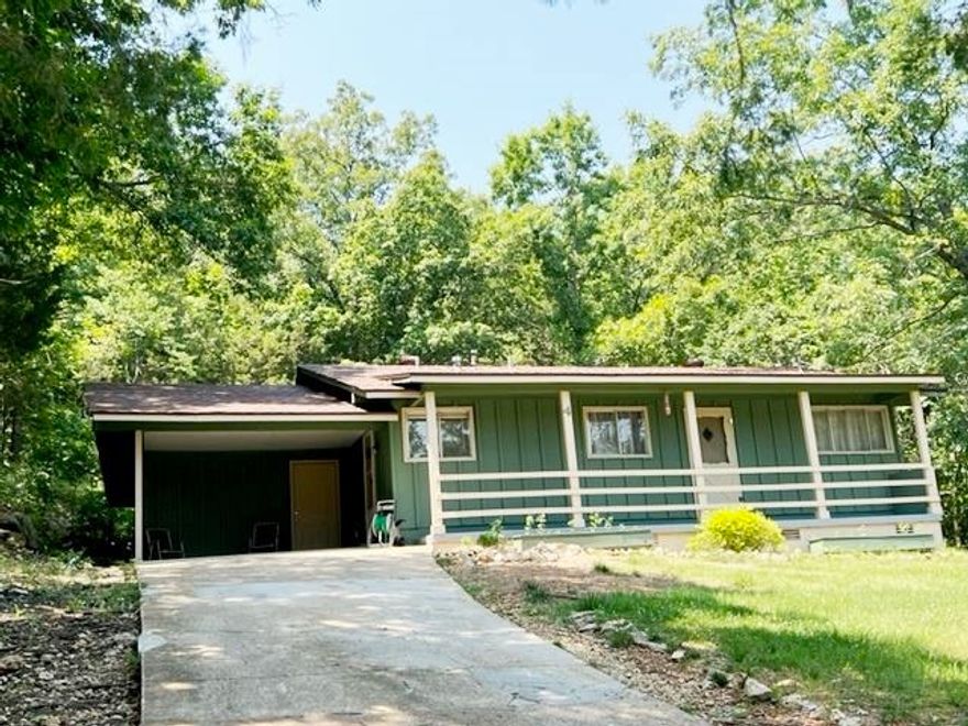 CLOSE TO TOWN CENTER - MOVE IN READY! This 1175 sq ft 3 bedroom 1 1/2 bath includes bonus room 14'2 x 13'6 reached from carport and is perfect for workshop, crafts, office, many possibilities. Home has been recently painted, has new luxury vinyl plank floors, new living room fan, central gas heat is approx 2 yrs new as is gas water heater. NEW ARCH ROOF, new h/a thermostat. NEW SEPTIC installed 2020 per owner. Refrig, stove, washer and dryer all included in listing price. Plus this home comes with a 1-year home warranty from Choice Home Warranty, its their Choice Ultimate Plan (Coverage Sheet in MLS) a $660+tax value!  Also includes outside COOK storage building plus extra storage closet. No close neighbors- $115,000. Call to preview. Listing #2357