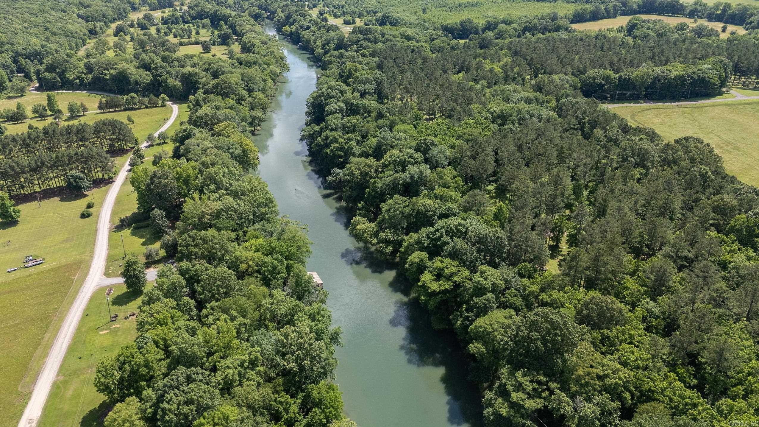 Amazing lot with breathtaking views of the River. Lot has been perked and ready for your new home. 3 acre lot with approximately 234 feet of river frontage. Located in River Creek Estates Subdivision. No mobiles, minimum sf is 1200. Call me today for move information.