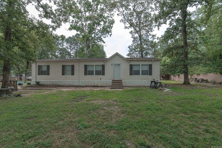 If you’re looking for space without breaking the bank, this is it! This 4-bedroom, 2-bath mobile home offers 1,680 square feet of comfortable living on a permanent foundation. Built in 2015, it’s all electric with gas available in the area.  A few updates are underway, including new flooring in the bathrooms & seller finishing  flooring in the bedrooms—giving you a head start on making it your own. While it’s not perfect, the layout is practical, the price is right, and the location is convenient. Whether you’re a first-time buyer, investor, or someone looking to downsize without giving up space, this property checks the boxes.