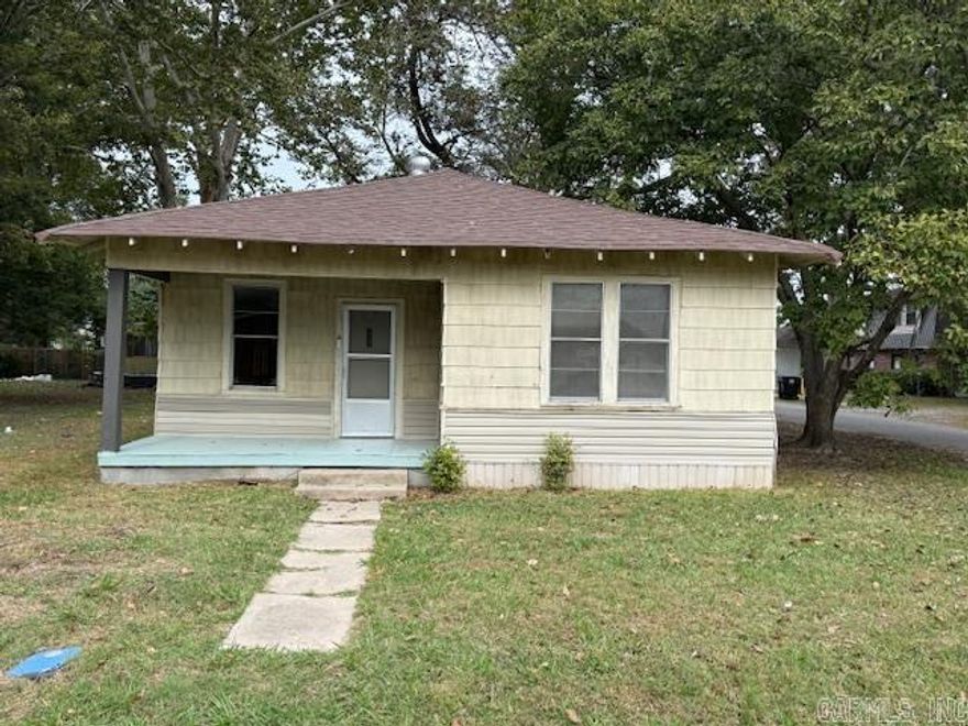 Investors dream a 2 for 1 property.  Behind the main property is an older house mobile home.  They both rent.  It can be your home with a rental unit behind or both rental.