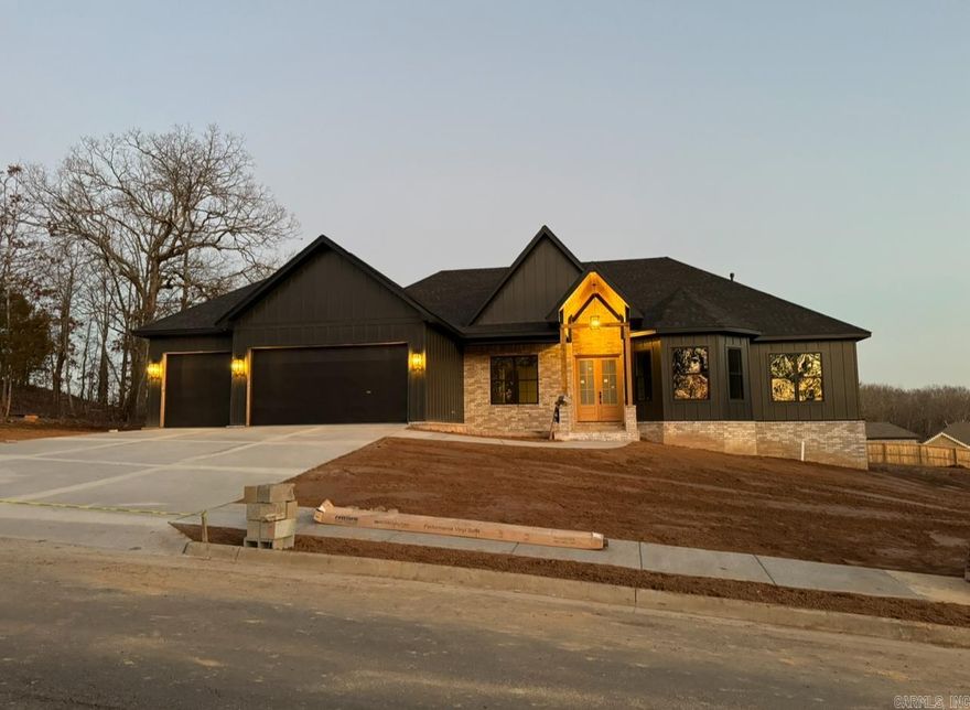 Construction is about to wrap up on this one of a kind build by Down Home Customs. Builder is ahead of the game and offering $12,000 to buy down the rate or go towards closing costs! To be completed soon in the newly developed Millers Ridge gated division of Millers Glen. Custom. Custom. Custom. Every detail has been thought through and meticulously designed. From the cathedral style living room ceiling to the custom built office doors. White Oak everywhere from the beams and floating shelves as well as the kitchen island. 10ft ceilings throughout. All interior doors are 8ft and solid. Entire house will be wired for high speed internet as well as surround sound. Master suite has tray ceiling and 2 walk in closets. The master bath offers a spa type experience with the multi-valve multi-shower head system. The back patio will have a full kitchen with sink and gas hookup. Build Specs - 3300sqft, 4bed, 3 and 1/2bath, huge office, formal dining, 3car garage, full laundry room.