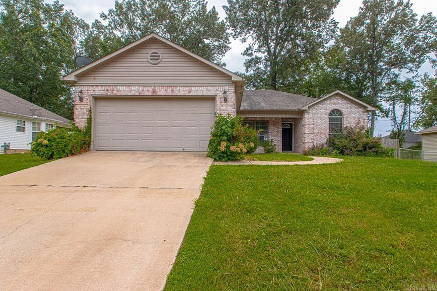 Welcome home! 3 bed 2 bath with 2 car garage. Kitchen features wood cabinets and updated appliances. Large living room with fireplace. Guest bedroom feature vaulted ceiling. Master has a tray ceiling with jack and jill sink, his and her closets, and jetted tub. Large fenced in backyard. Schedule your showing today!