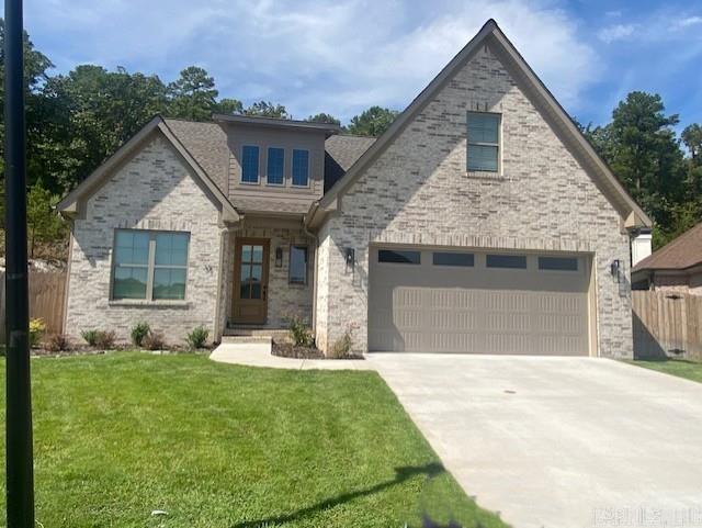 Quality abounds new construction located on level lot with a backdrop of nature and rock cliff guaranteeing privacy and serenity. Stunning 2 story foyer entrance with versatile floor plan. French door office with connecting half bath. Chef's kitchen - large kitchen island, breakfast bar, 5 gas burner cooktop, GE stainless appliances, soft close drawers, large pantry, under cabinet lighting - quartz countertops. Cozy floor to ceiling stone gas log fireplace, exposed ceiling beams and abundant storage. LVP flooring for durability, spacious laundry with built-ins and folding area, tankless water heater. Primary bath has soaker tub, floor lighting and seamless glass shower. Upstairs are 2 or 3 bedrooms with game room, Jack and Jill bath, and attic storage. Covered patio, sprinkler system, gas hood-up for grill, outdoor plug for TV. 24' deep garage. Subdivision nearly completed - conveniently located! See agent remarks.