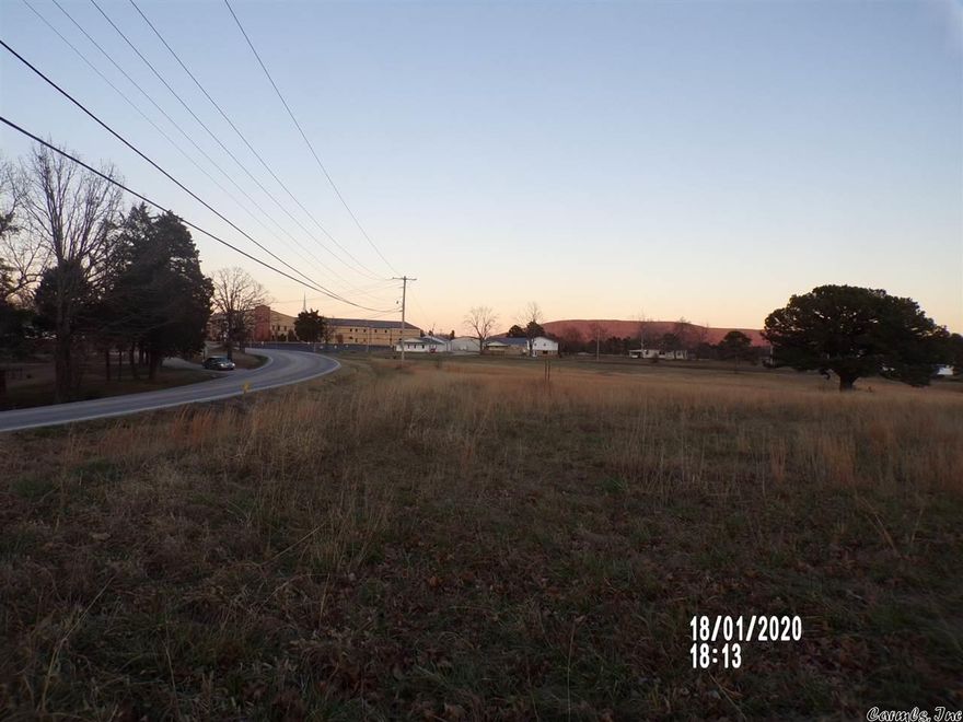 HIGHWAY COMMERCIAL PROPERTY ALONG STATE HWY 14 WITH VIEW OF THE BEAUTIFUL OZARK MOUNTAINS PLUS RESIDENTIAL PROPERTY BEHIND THE COMMERCIAL PROPERTY.  This property has so much potential.  Great location for new business, rental properties or nice homes.  This property has city water and sewer on this property's side of Highway 14.  Close to hospital and schools.   All for $258,000.00.