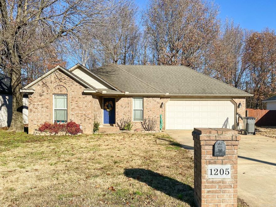 Searching for a charming custom-built, one-owner home? Step inside to discover an open floor plan that blends style and functionality. The kitchen boasts custom cabinets and sleek stainless steel appliances. The tile backsplash makes this kitchen standout. Relax in luxury within the primary suite with vaulted ceilings. The ensuite bathroom provides relaxation, featuring dual sinks, corner jet tub and walk-in shower. Plus, there's no shortage of storage with a generously sized closet. Outside awaits an oversized patio great for entertaining, shade trees and a convenient storage building. The garage plenty of room for vehicles and additional storage. With every thought in mind while building this home, this property is ready for its next owners. Don't miss our on the opportunity to make this house your dream home!