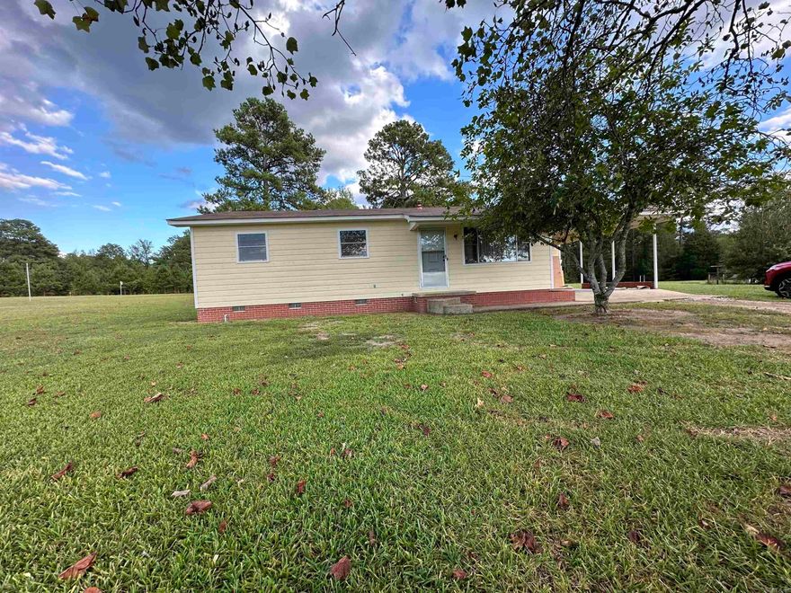 ADORABLE and WELL MAINTANED HOMEPLACE!! Don't miss this one!!! What a gem!!! Hardwood floor, original tile and kitchen cabinets are all original and so beautiful!! With over 2 acres you can spread out and breathe! Or build the dream shop! Let's get this one a family that loves it as much as it has been loved its lifetime with its one and only family. Freshly painted exterior and new roof!