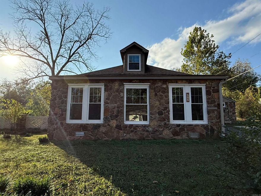 This charming historical home is a must see! Original built-ins, several original doors and hardware, and original wood burning fireplace retain this home's vintage charm, while some newer updates including fresh paint throughout bring a bright and fresh feel. The roof, windows, and plumbing have all been replaced within the last 10 years further enhancing the home’s long-term durability. This home offers spacious bedrooms with many other rooms, providing endless possibilities, including a bonus room upstairs! Outside of the home, you will find a double insulated shop, and a gazebo perfect for relaxing with friends and family! Ideal for someone who values a blend of history and modern convenience, this home is a true find! *photos were taken with a slide wide-angle to allow full view of each space. The floor plans are estimated and may not be completely accurate.* See agent remarks