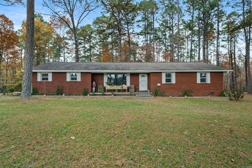 GREERS FERRY LAKE ACCESS less than 5 miles from Lacey’s Marina, this home offers the convenience of easy lake access, while also providing the privacy of 2.5 acres of flat, thoughtfully manicured trees that create a peaceful, park-like setting. Inside, you’ll find many updates, including beautifully done bathrooms & kitchen. The hall bath includes a soaking tub with subway tile surround. New windows, luxury vinyl wood plank flooring, new paint & added disc lighting are just some of the quality finishes you'll find. The primary bedroom has a cozy sitting area—your own personal retreat. Step outside to a spacious 13' × 15' covered back deck, perfect for entertaining or relaxing. Being completely closed makes it pet friendly and baby safe. There is also a path to a pergola, which is perfect for taking in the beauty this property has to offer.  All appliances convey, along with the storage building. As an added bonus, the seller is including a one-year home warranty. Discover the perfect blend of  comfort, convenience, privacy, and natural beauty on this stunning 2.5-acre updated property. 39 mi to Conway, 20 mi to Heber Springs & 20 mi to Clinton. SEE ALL FEATURES IN DOCS & PIC.