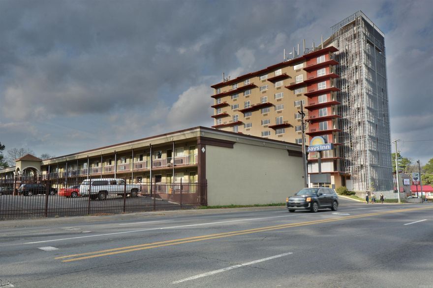 DAYS INN BY WYNDAM- HOT SPRINGS- 2 STORY 82 ROOM OPERATIONAL MOTEL   *PLUS* VISTA TOWERS (10 STORY 80 ROOM HOTEL -ORIGINALLY ROYALE VISTA INN & DERBY THEATER) ALL ON 3.68 ACRES MOL WITH PARKING FOR 250-300- READY TO BE REMODELED TO ITS ORIGINAL GLORY --SOME ROOMS HAVE BEEN COMBINED TO MAKE 2 ROOM SUITES--REMODELING HAS BEGUN WITH SOME WALLS, SHEET ROCK, & WORK IN PROGRESS.  CATTY CORNER ACROSS FROM OAKLAWN RACING AND CASINO DERBY THEATER & LOUNGE WITH "GOOD BONES" IN NEED TOTAL REMODEL (20,000 SQ FT +/-)