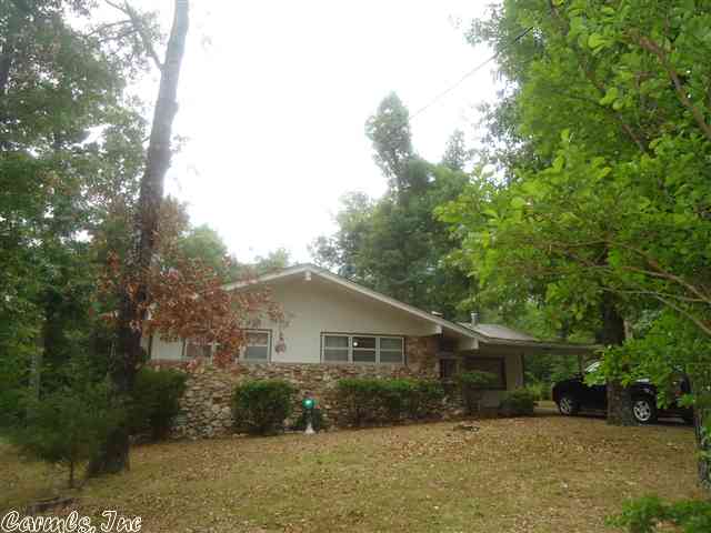 LOOKING FOR A LARGE HOME IN A QUIET NEIGHBORHOOD? Then look no more. This 1760 sq ft 2 bedroom 1.5 bath home sets on a nice tree shaded lot. Home includes a living room & HUGE separate den/family room. Master bedroom has a 10X28 deck off back of the home for your morning coffee.Kitchen has tons of cabinet space w/separate pantry,range. Rounding out the home is attached workshop area to store your tools & lawn mower. OWNER SAYS: "MAKE AN OFFER!!!!"