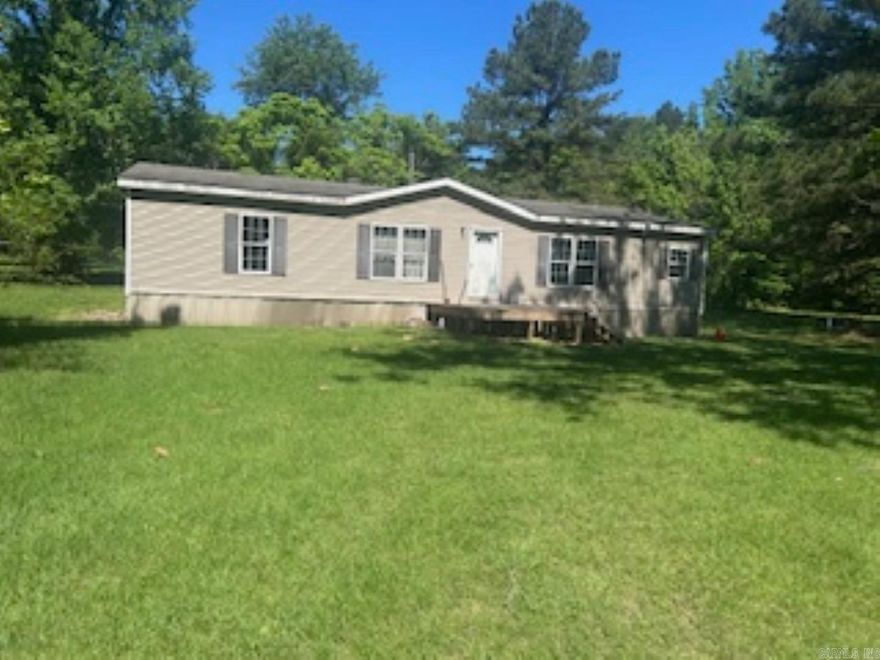 Discover your perfect retreat with this beautiful, private 5-acre property! This nicely updated 3-bedroom, 2-bath mobile home offers 1,568 square feet of comfortable living space. Ideally situated between El Dorado and Camden, you’ll enjoy quick commutes to work, shopping, or town amenities. Don’t miss your chance to own this peaceful slice of paradise—schedule your visit today!