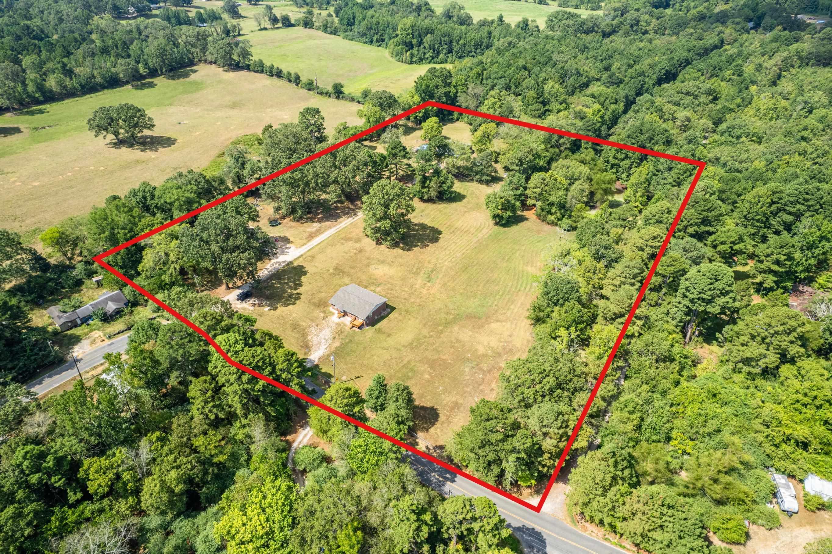3 homes on over 7 1/2 acres! Beautiful country setting in Lake Hamilton School District. Live in one of the homes and lease the other two. Plenty of room to build more homes. Mobile homes are allowed. Lots of options! Currently, all three are leased. Two - 3/2 One - 2/2