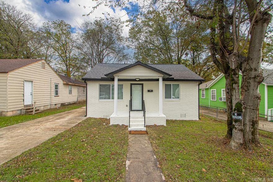 Welcome to 3137 Center St., a beautifully renovated 3-bedroom, 2-bathroom home combining modern style with timeless char. This home boasts a stunning new kitchen with stainless steel appliances, shaker cabinetry, and ample counter space - ideal for both family meals and entertaining. The spacious primary bedroom features a walk-in tile shower with elegant fixtures, complemented by a stylish barn door that adds a touch or rustic harm. Each bedroom is filled with natural light, and both bathrooms have been remodeled with contemporary finished. With new flooring, fresh paint, and updated fixtures throughout, this home is truly move-in ready.