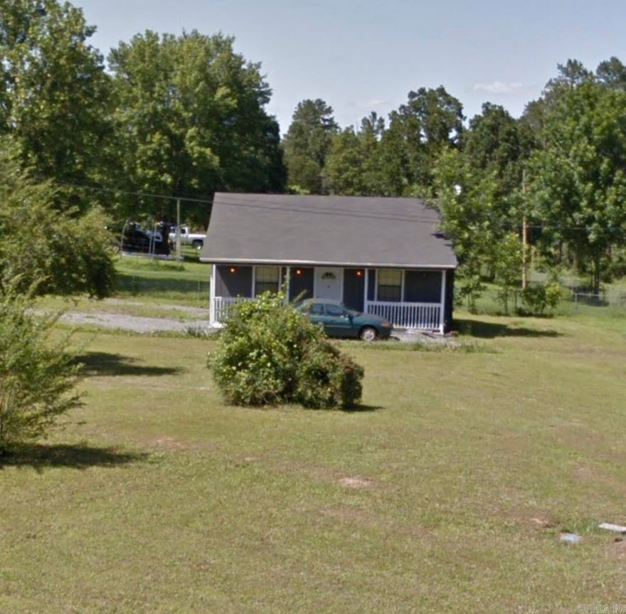 2 bed 1 bath home on approx. .50 acre