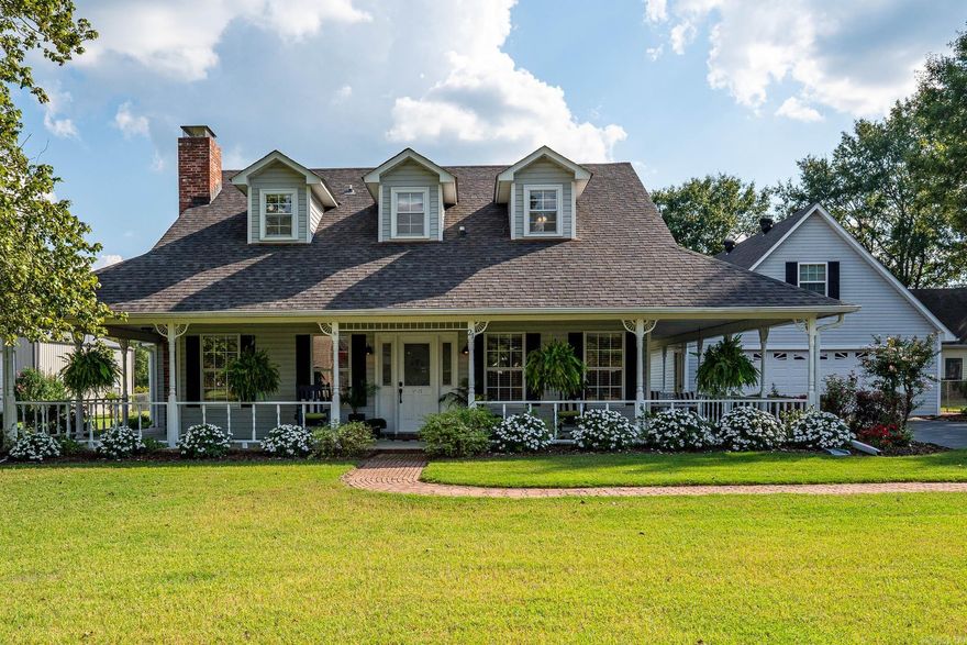 This absolutely beautifully maintained and updated 3 bed/2 bath Greenbrier home w/wrap around porch on a large perfectly landscaped lot w/a workshop is a dream! Great foyer area w/beautiful staircase leading to the second level. Downstairs the living room features a wood-burning fireplace & nice sized formal dining room. The kitchen has been updated with granite countertops, backsplash & stainless steel appliances. There is an eat-in breakfast area, tons of storage & separate pantry. The primary bedroom suite is on the main level with a large bath, double sinks, soaker tub & walk-in shower. Upstairs has a landing that’s the perfect flex space & two guest bedrooms that share a large hall bath. The detached garage has a workshop in the back with workbench, storage area & roughed in bathroom. Upstairs over the garage there is a large finished out bonus room & additional room. Fenced area in the backyard w/a separate storage building The entire property has been immaculately maintained. Gorgeous landscaping throughout & on a half acre lot.