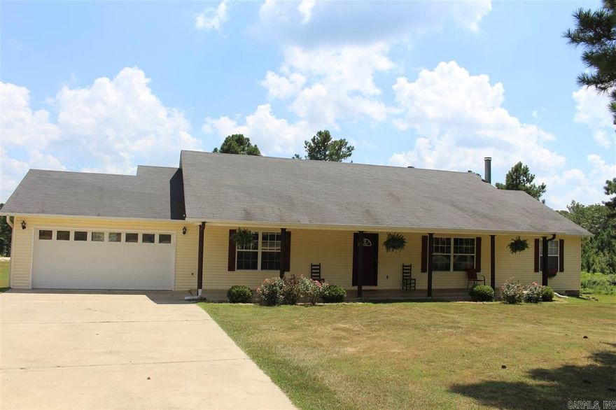 Beautiful country home with 3/3 sitting on just over 2 acres.  Vaulted ceiling in the living room, open floor plan.  Large bedrooms, bathrooms & closets.  His & Hers in master.  Downstairs has a large den with a separate office.  The walk in basement has tons of storage and a safe room.  Covered front porch and large covered back deck.  This home is a must see and will not last long at this price BELOW market value.