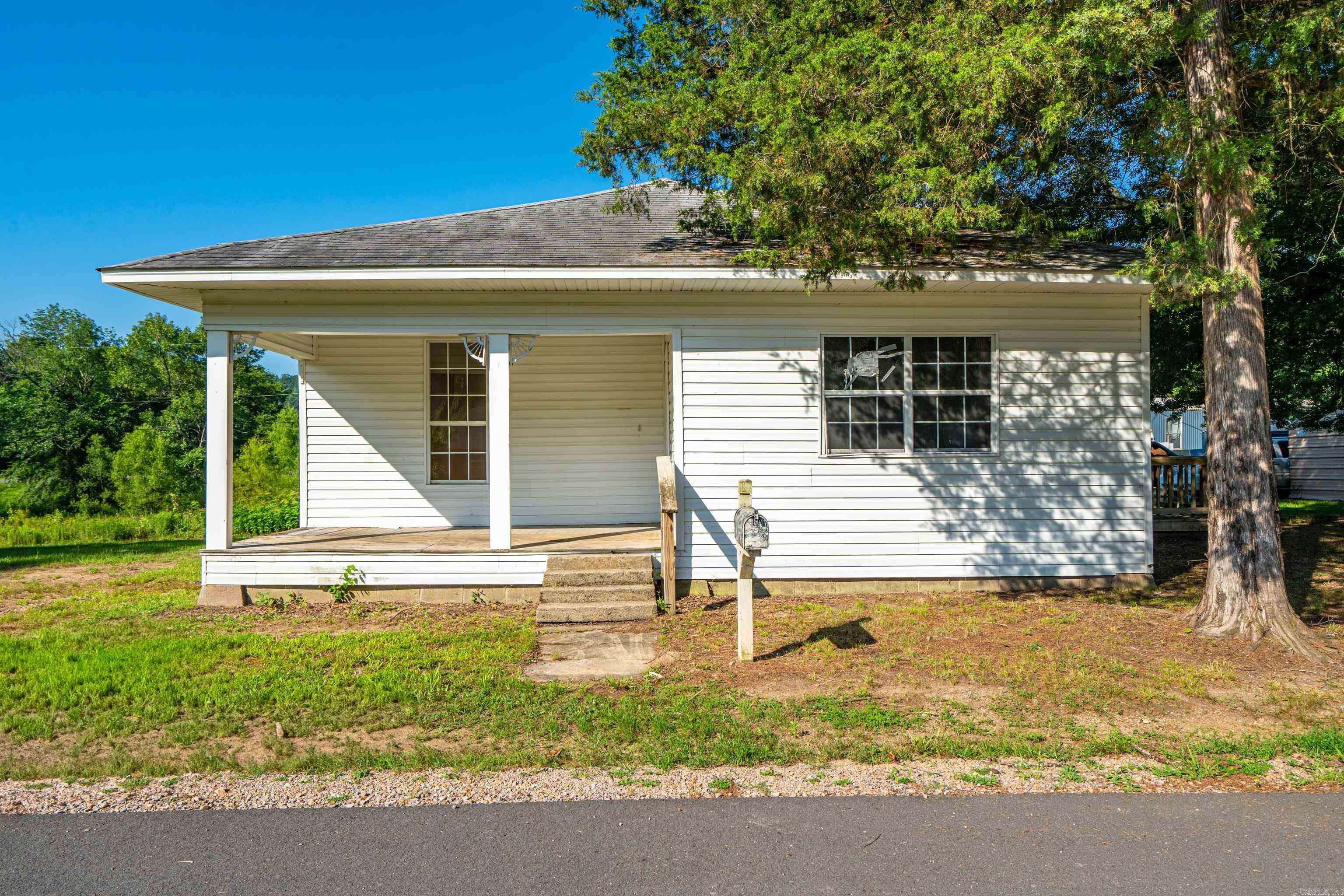 Welcome to 611 S 2nd St ,Glenwood ,Arkansas! This would make a nice Investment property that already has 5 lots rented only 2 available ,total 7 lots that each have city water and sewer .They have 30 or 50 amp outlets, some have both,plus , a house with 1275 sq ft. that has 3 bedrooms,1 bath.Seller started updating he has so far had electrical in 1995.The siding,windows and side deck done around 2001.The hot water heater was replaced in early 2019.There is a storage building that is located directly behind the house that conveys with property that is 12ft X 28 .