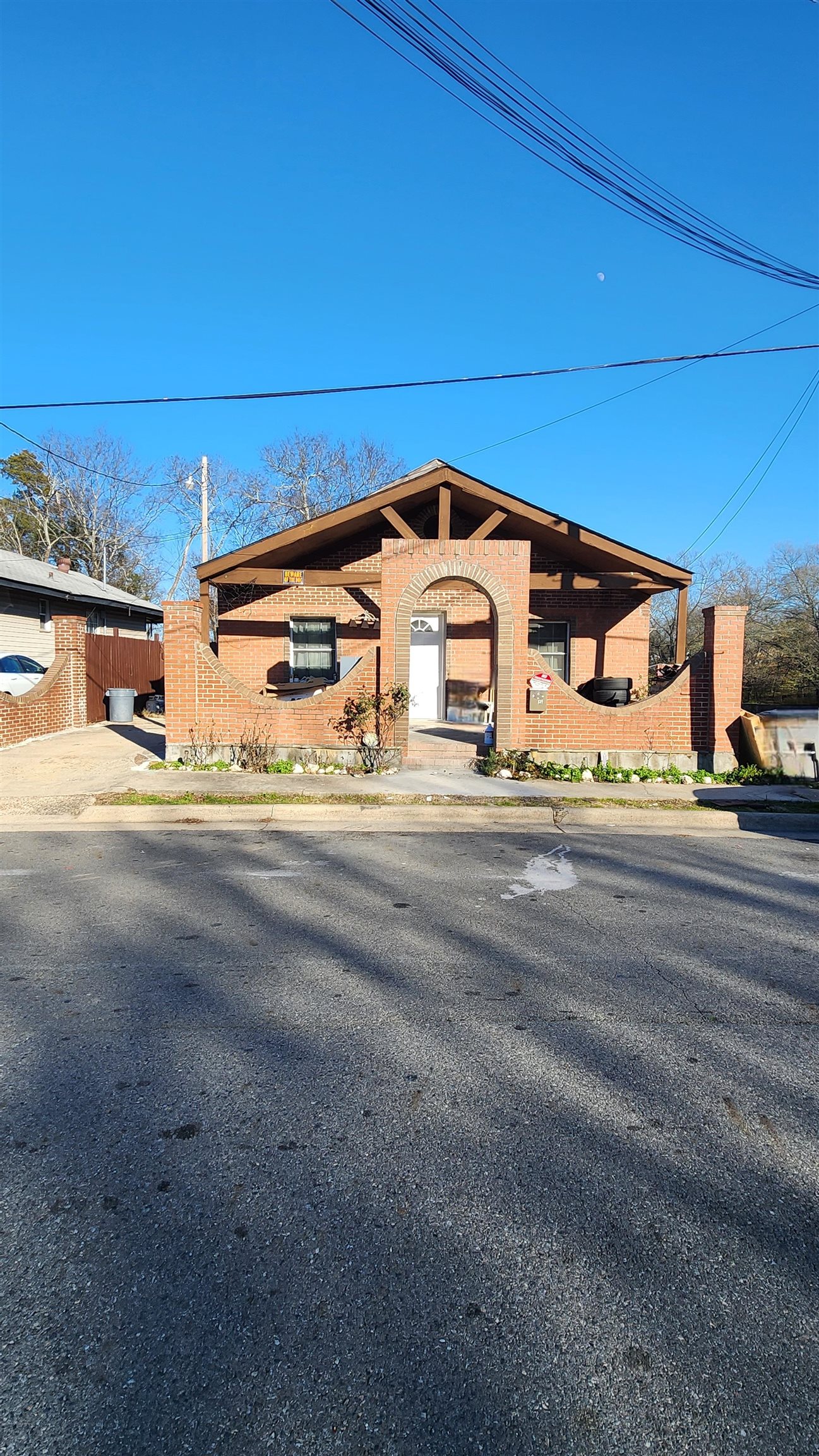 Property is in comercial lot as well! Charm house in excellent location! beautiful tile floors throughout the house, nicely updated bathroom. There's an extra room on the back. Stop by and see the potential! agents see remarks for showing instructions.