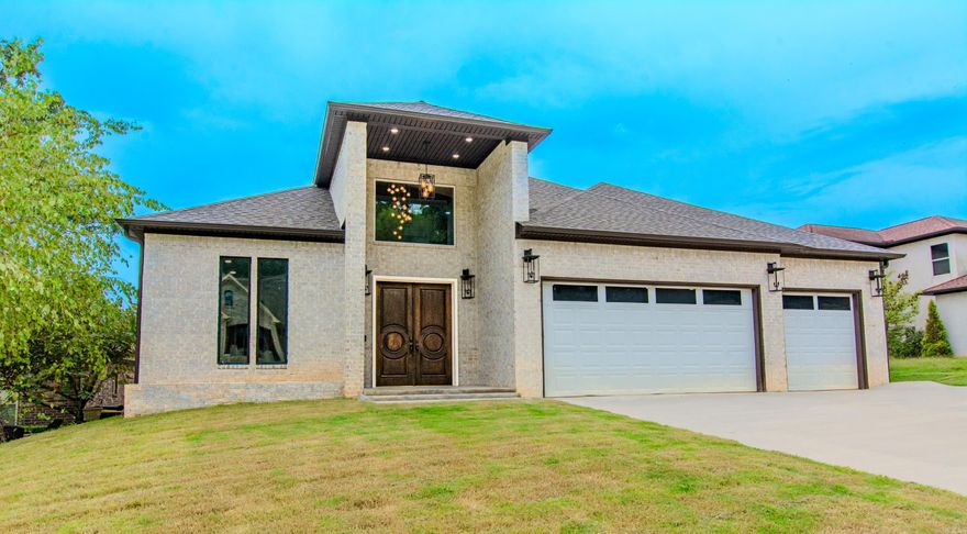 A true statement home in Kanis Oaks, designed for elevated living, entertaining, and unforgettable gatherings. This stunning 4-bedroom, 3.5-bath residence offers approximately 5,128 sq ft of thoughtfully designed space with an open floor plan and upscale architectural details throughout. The impressive entry welcomes you with barrel and tray ceilings, designer lighting, and abundant natural light. The chef’s kitchen is a showstopper, featuring an expansive 5×11 island, double ovens, an 8-burner stove, oversized pantry, and luxury vinyl flooring throughout the main living areas.  Additional features include a home office, mudroom, and 3-car garage. Entertainment spaces shine with a dedicated home theater and bourbon/entertainment lounge. Enjoy indoor-outdoor living with a balcony and patio, perfect for relaxing or hosting. Finished with 72-inch ceiling fans, generous bedrooms, and well-appointed baths. This residence is more than a home—it’s a statement of design