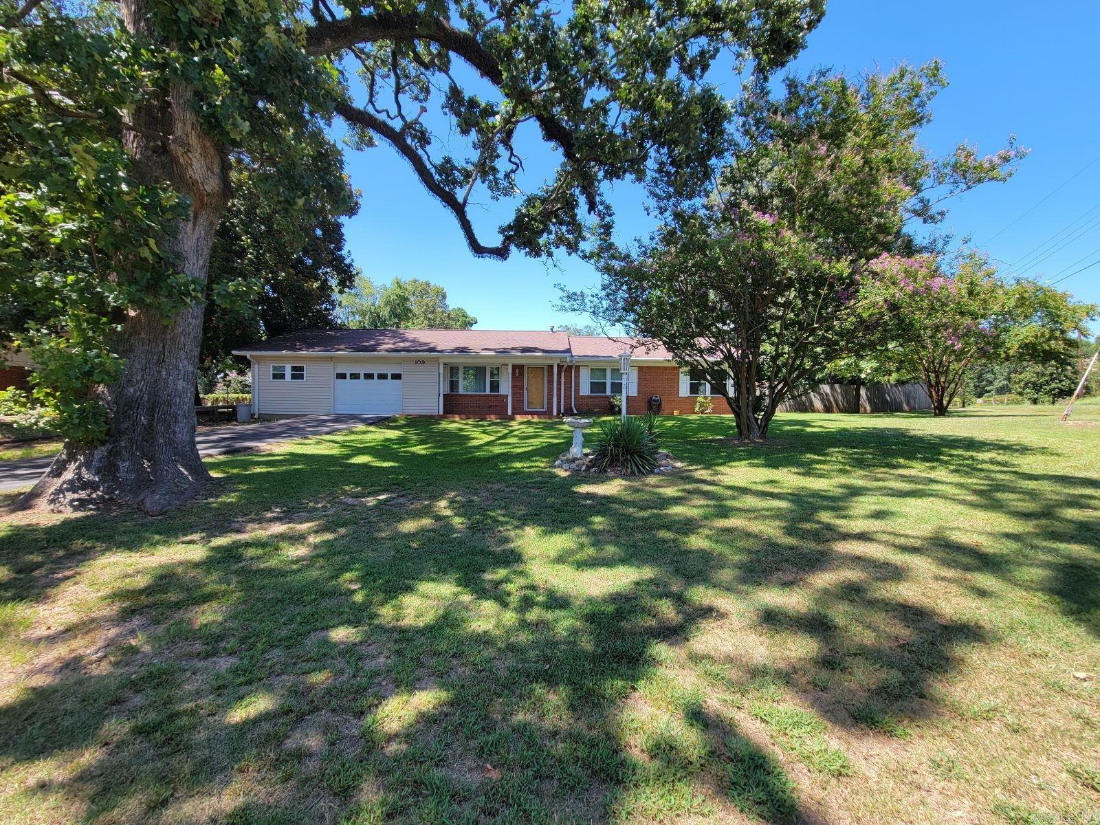 Spacious brick home in a quiet neighborhood. Fenced backyard great for entertaining and cookouts. Formal living, family room with kitchen dining combination and 3 bedrooms 2 baths. Attached garage and shop, all city utilities on a beautiful tree shaded lot.