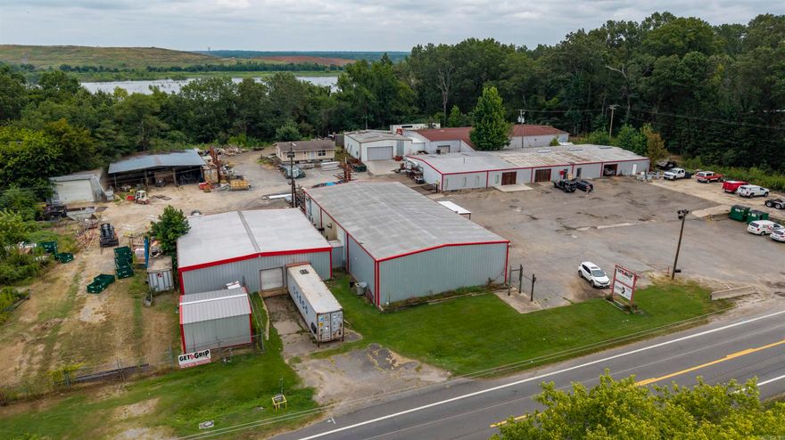 Rare commercial opportunity on 3.77 acres in North Little Rock/Jacksonville Area featuring 6 heated metal buildings totaling over 27,000 SF, plus a 1,200 SF unfinished home and 60'x60' covered storage area. 490' Frontage on AR Hwy 161.  Buildings 1 & 2 include a 60'x150' and attached 60'x120' metal structure with loading dock, powder coating oven, 3-phase 480V power, and upstairs apartment. Building 3 is 50’x60’, Building 4 is 50’x100’, Building 5 is 50’x55’—all heated. Building 6 is a 30’x60’ insulated, heated silo. Some buildings have air-conditioned space. Ideal for manufacturing, warehouse, distribution, or contractor use. Convenient to I-440, I-40, Little Rock Port, and airport.